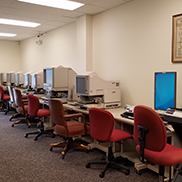 Row of microfilm and microfiche readers
