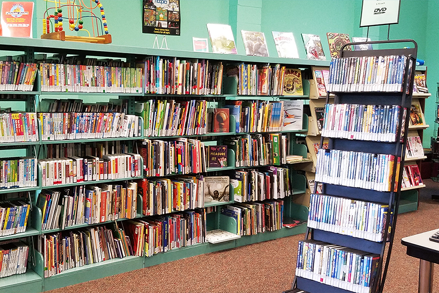 Trinity Gardens Community Library interior showing bookstacks